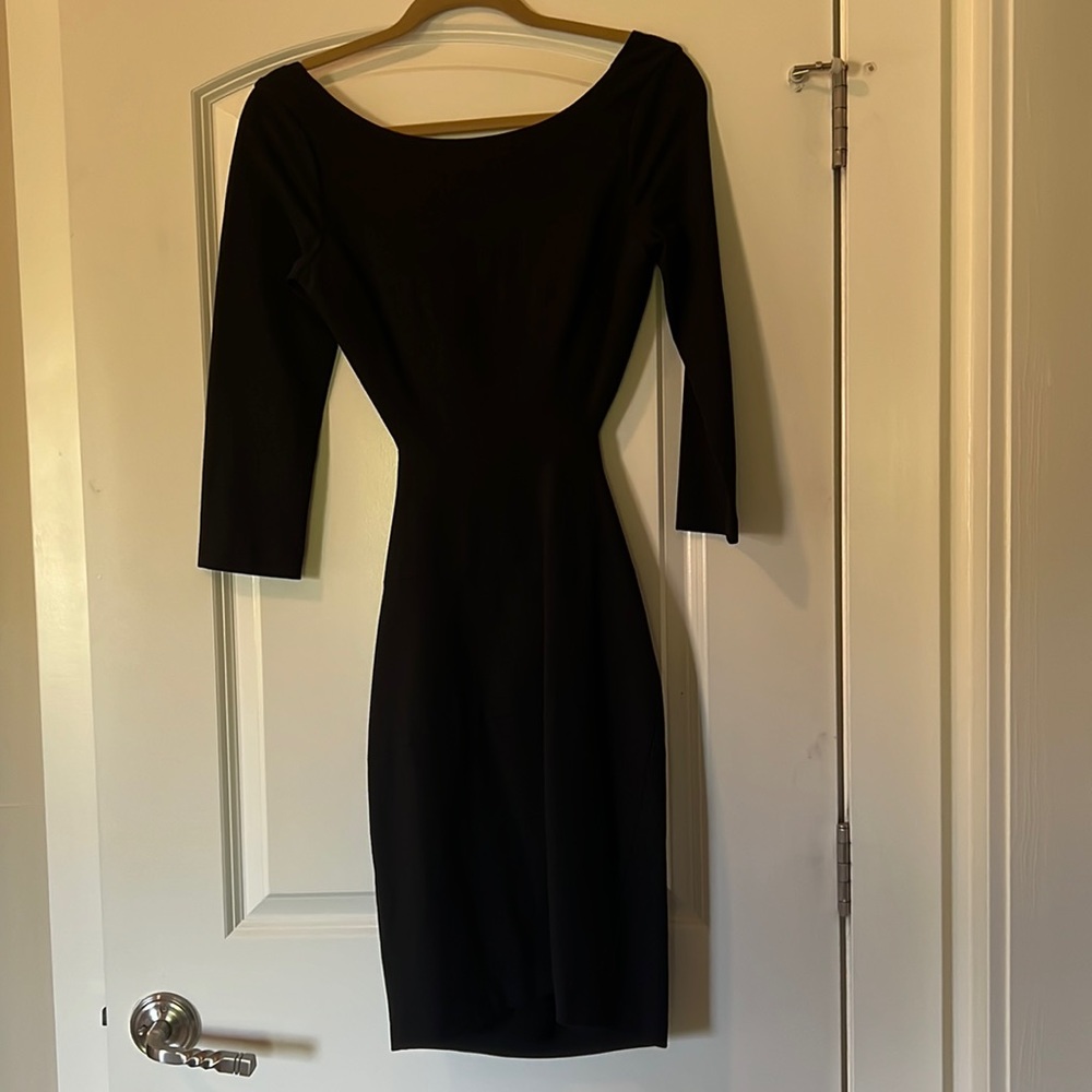 Lovely long sleeve, open back Halston dress